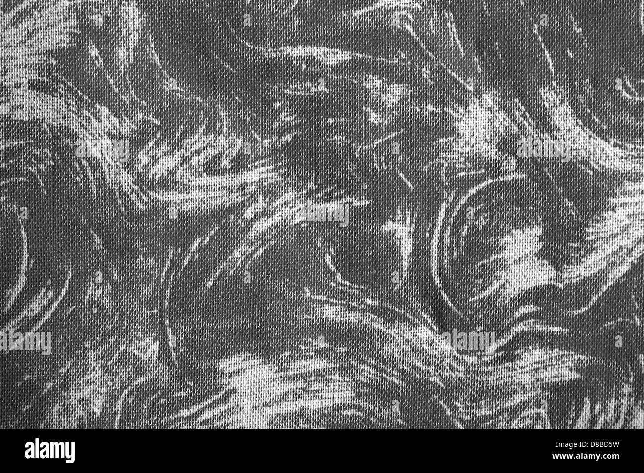 Tessuto con motivo a vortice grigio e bianco che mette in risalto la consistenza morbida e liscia del materiale. Il design vorticoso crea un effetto dinamico e fluente nell'aspetto del tessuto. Foto Stock Tessuto con motivo a vortice grigio e bianco che mette in risalto la consistenza morbida e liscia del materiale. Il design vorticoso crea un effetto dinamico e fluente nell'aspetto del tessuto. Foto Stock