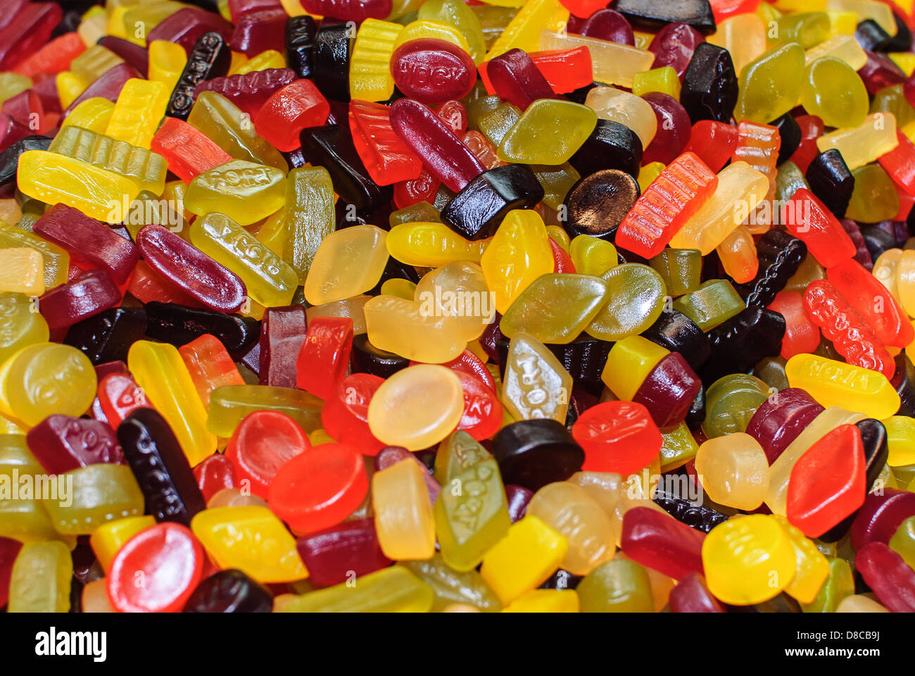 Multi colore gomme vini dolci su un mercato in stallo Salisbury WILTSHIRE REGNO UNITO Foto Stock
