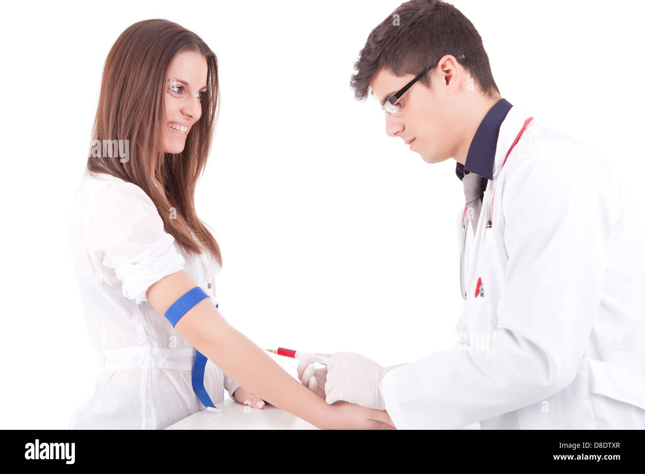 Il medico e il paziente, isolato su sfondo bianco Foto Stock