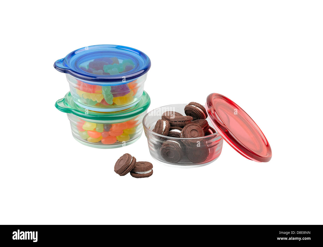 I tre colori di ciotole in vetro con coperchio in plastica per alimenti di storage Foto Stock