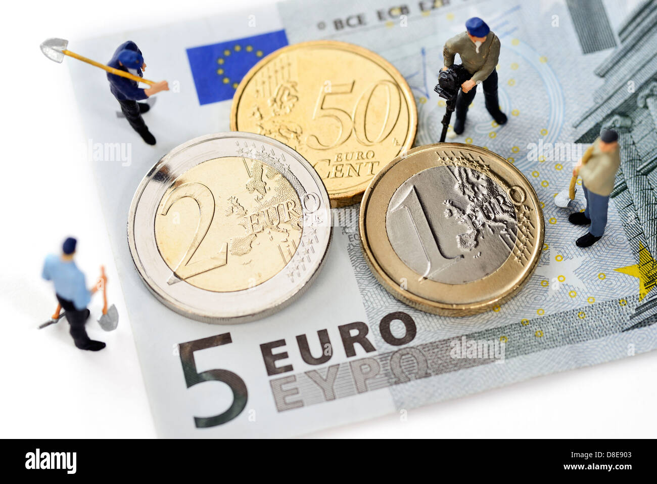 Monete metalliche in euro e lavoratori Symbolfoto 8,50 EUR salario minimo Foto Stock