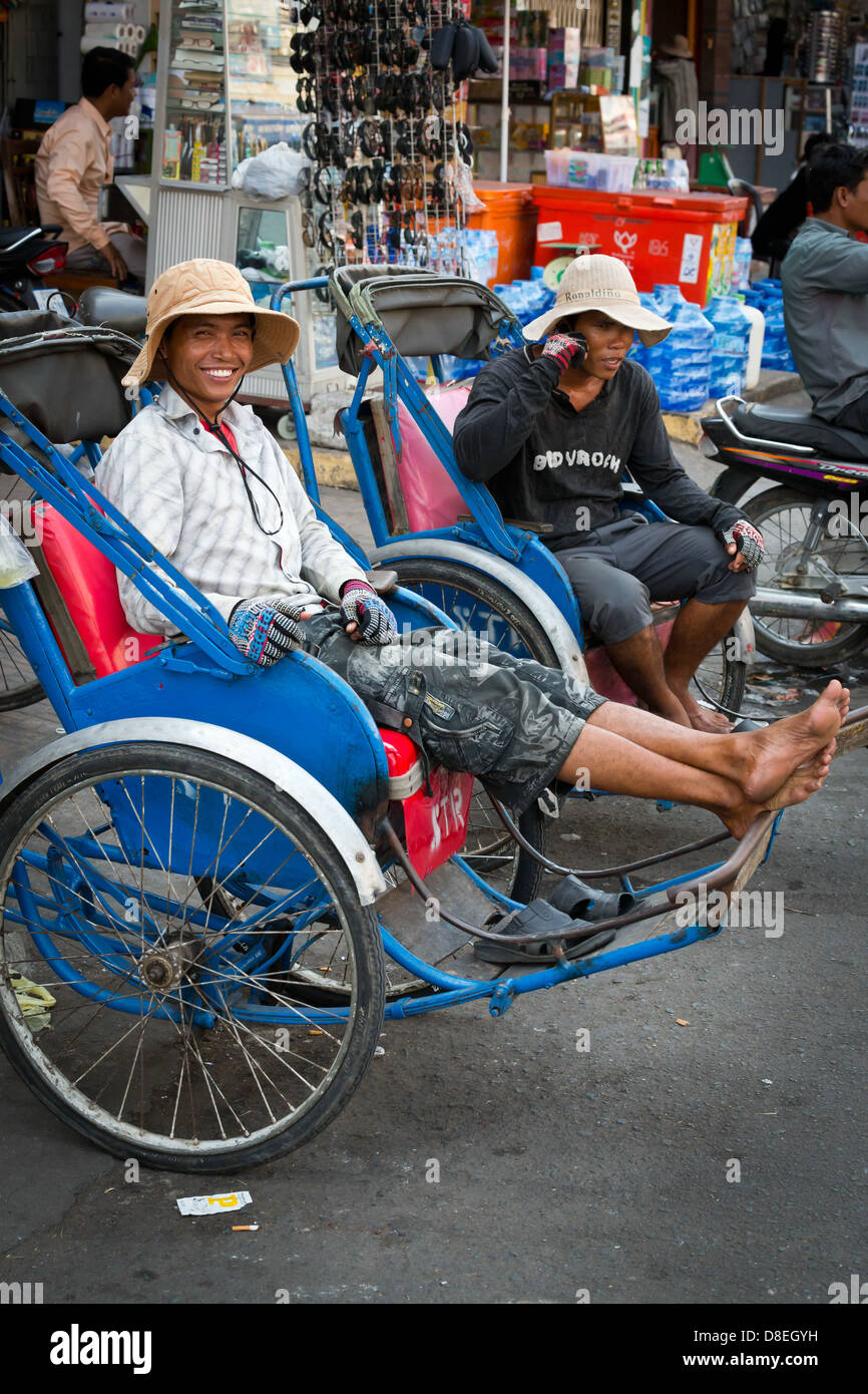 In rickshaw Driver in Phnom Penh Cambogia Foto Stock