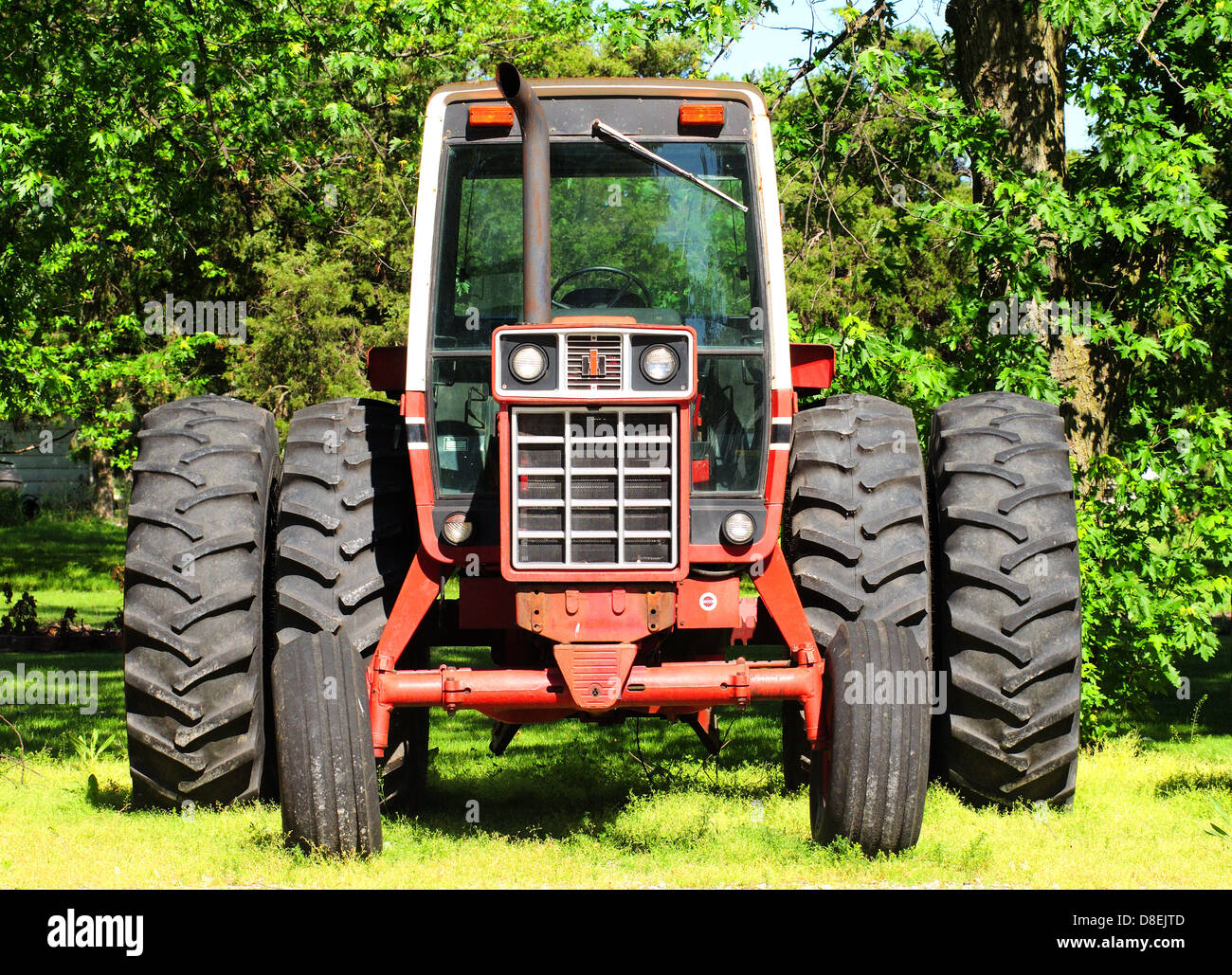 Un vecchio International Harvester trattore agricolo dagli anni settanta o ottanta Foto Stock