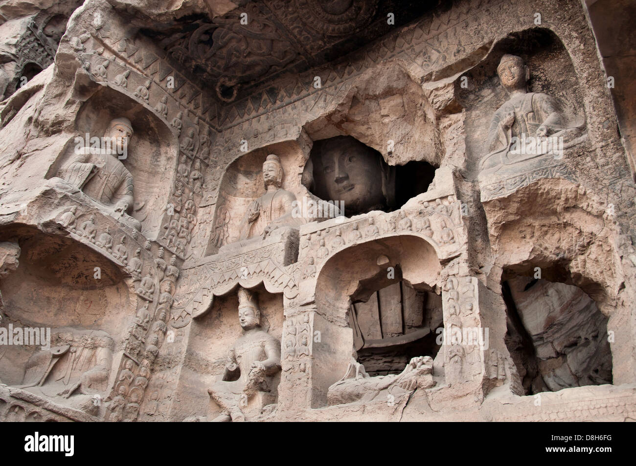 Buddha scolpito presso le grotte di Yungang, Datong, Cina Foto Stock