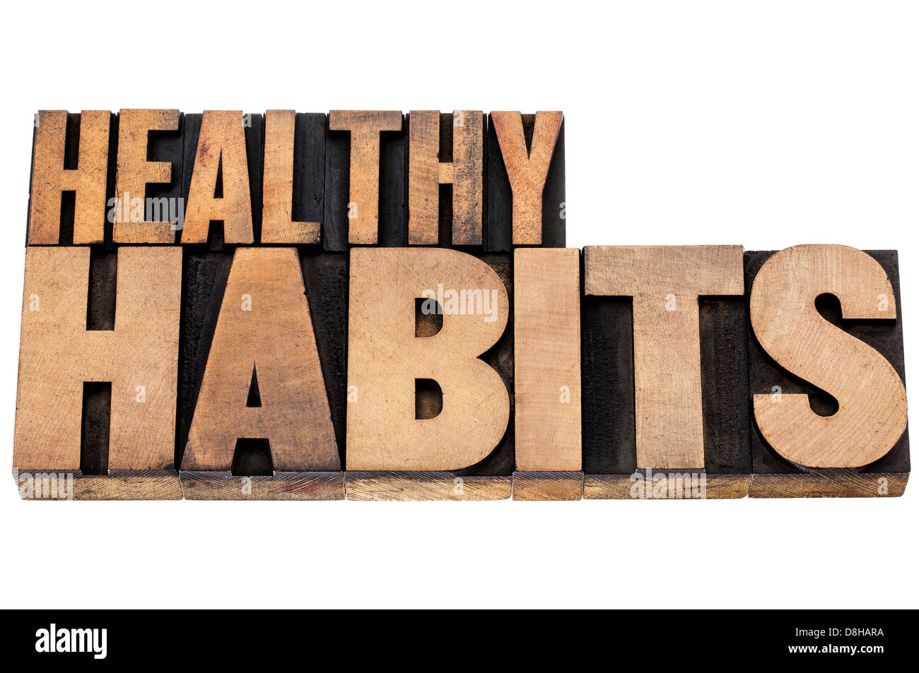 Le sane abitudini - concetto di benessere - testo isolato in rilievografia vintage tipo legno Foto Stock