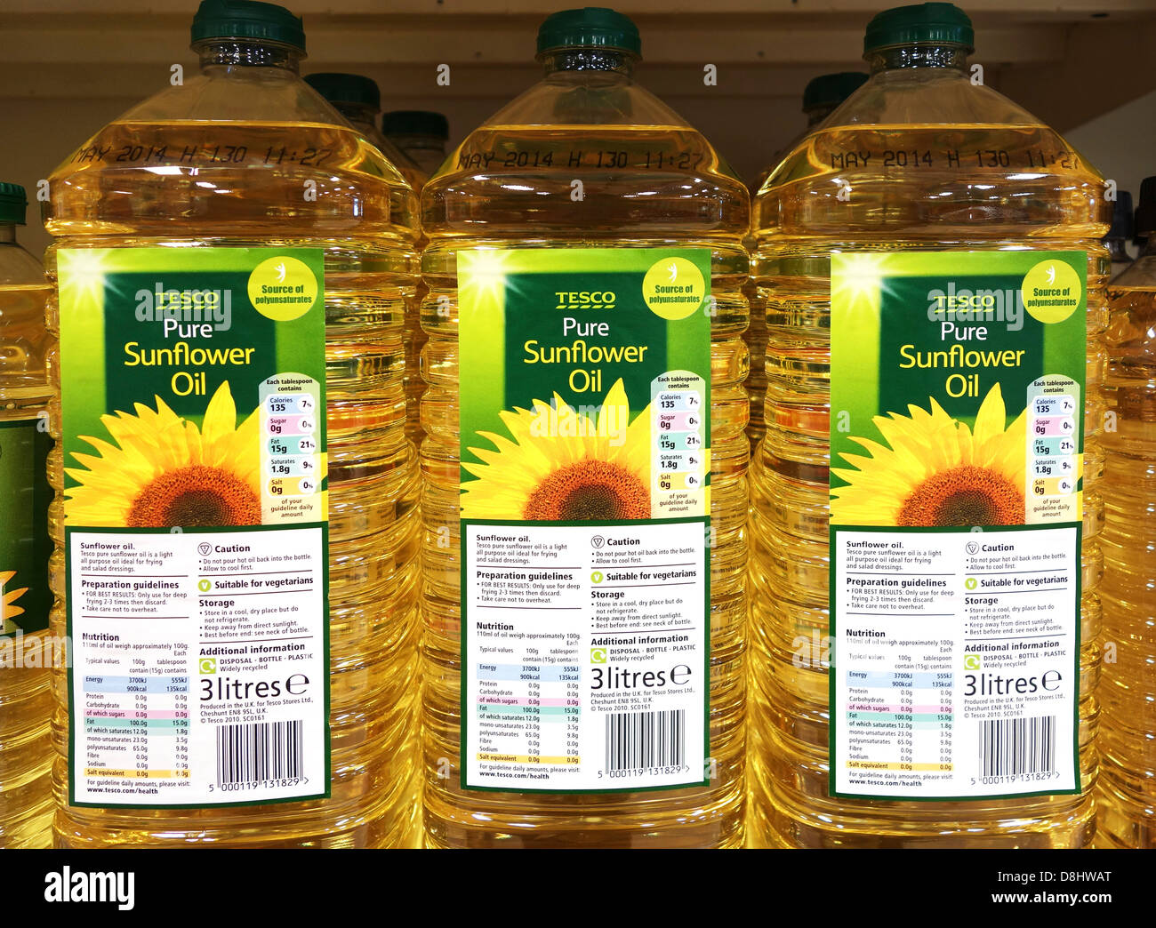 Bottiglie di puro olio di semi di girasole Foto Stock