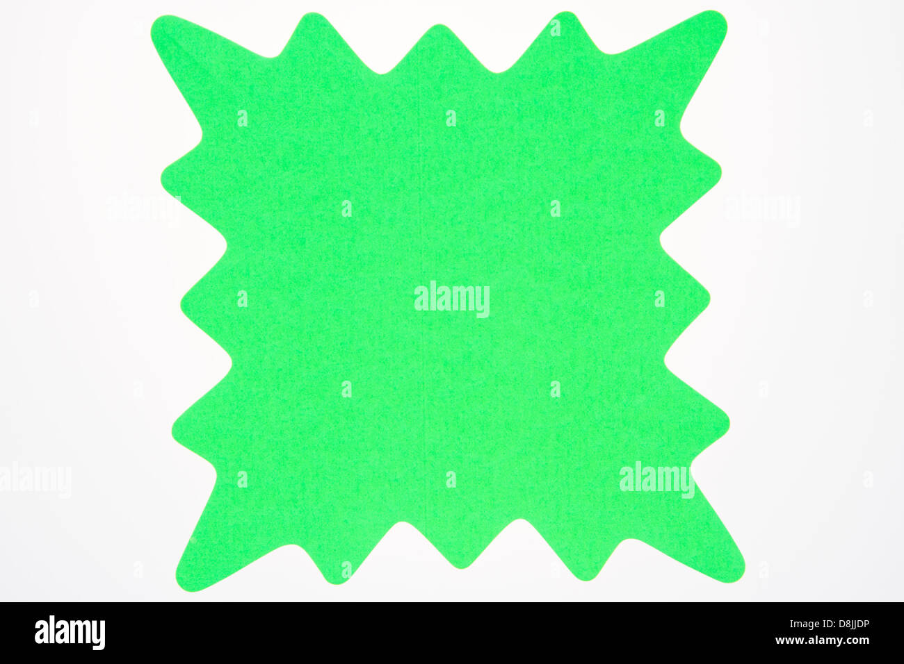 Un bianco verde a forma di stella segno usualmente utilizzati per pubblicizzare le vendite e specials isolato su bianco. Foto Stock