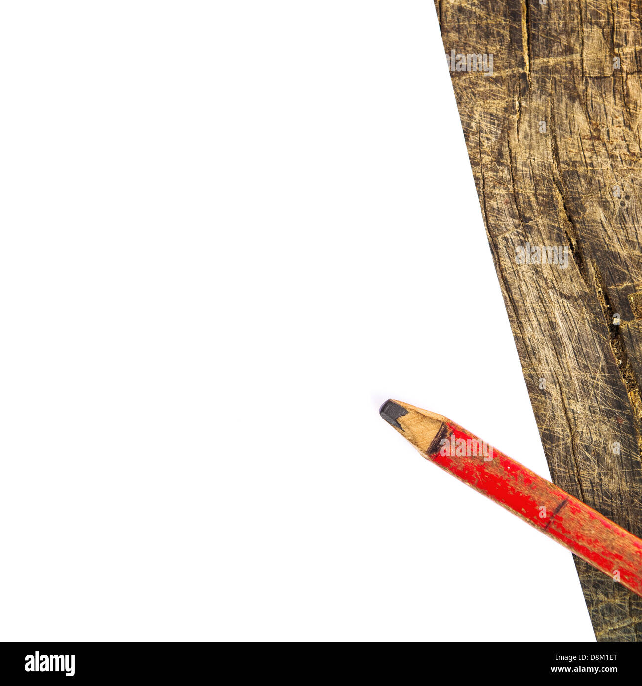 Vecchia matita piombo e bianco carta bianca su sfondo di legno. Foto Stock