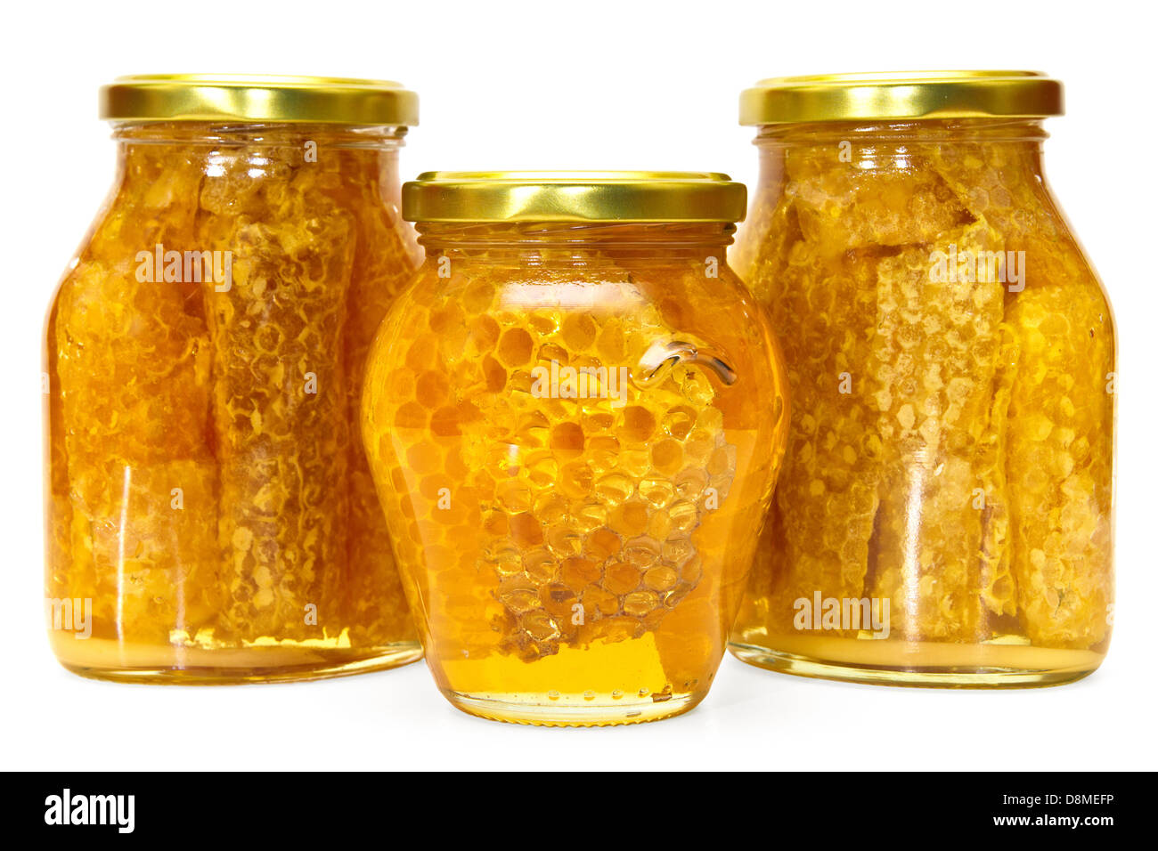 Barattoli di miele isolato su bianco Foto Stock