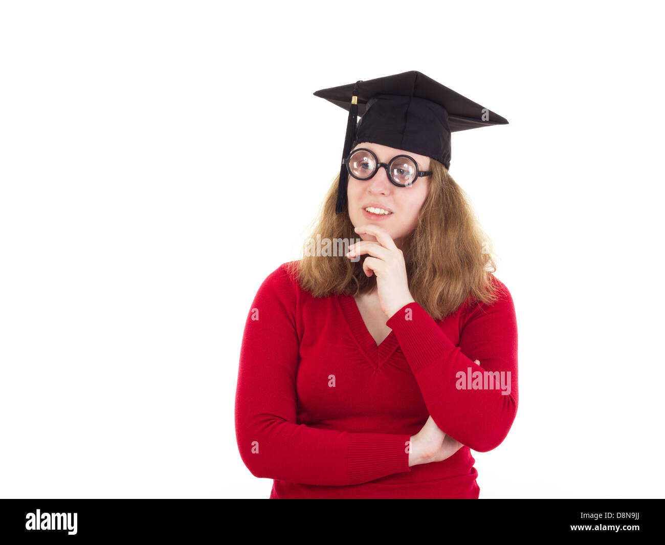 Laureato femmina pensare circa i suoi studi Foto Stock