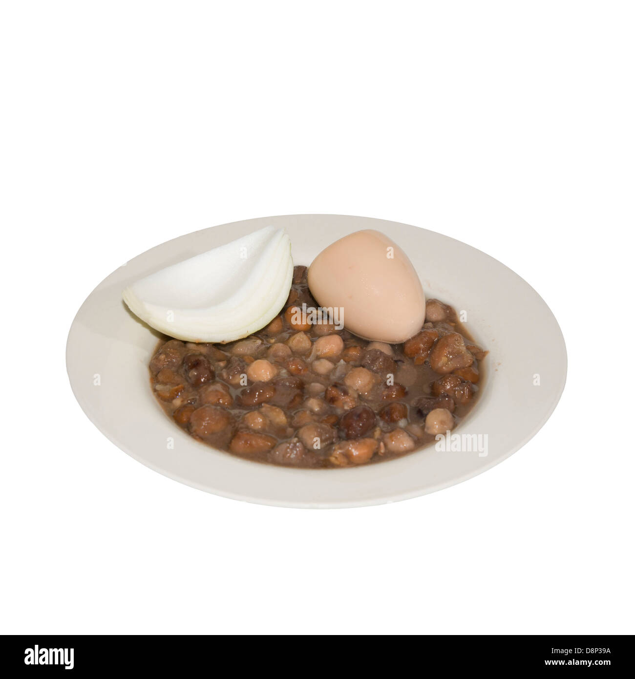 Ful medames un egiziano prima colazione piatto di cottura faba beans mangiato con pane o pita e cipolla spesso servito con uovo sodo Foto Stock