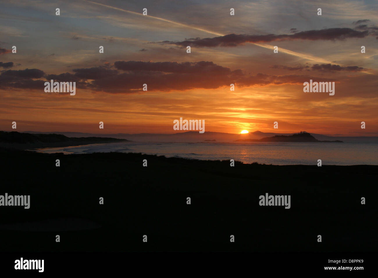 Vista al tramonto del Firth of Forth con Fidra Isola, North Berwick, East Lothian, Scozia Foto Stock