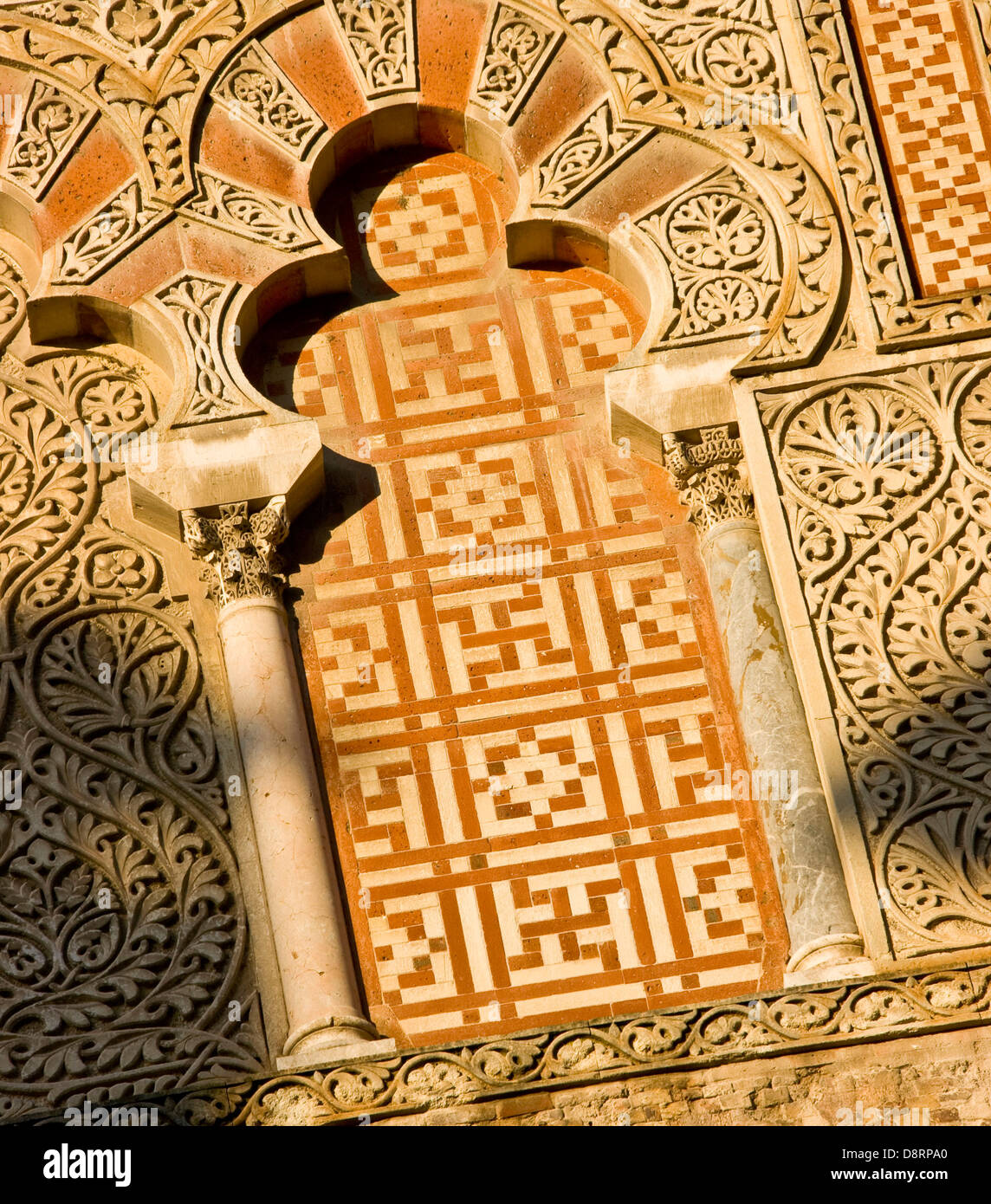 Mezquita moschea/cattedrale UNESCO World Heritage Site parete esterna modello dettaglio presso sunrise alba Cordoba Andalusia Spagna Foto Stock