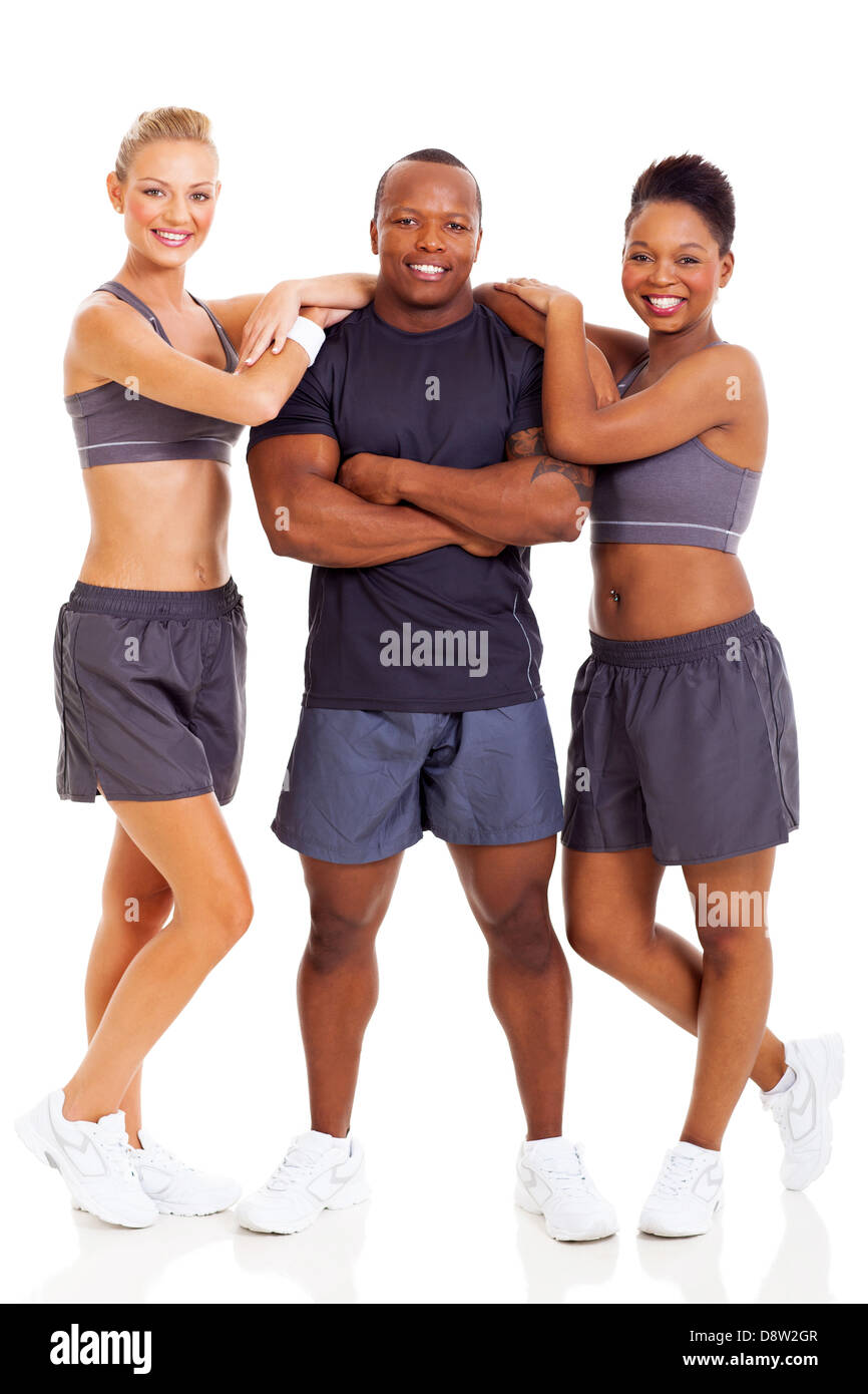 Un gruppo di giovani sani persone fitness su sfondo bianco Foto Stock