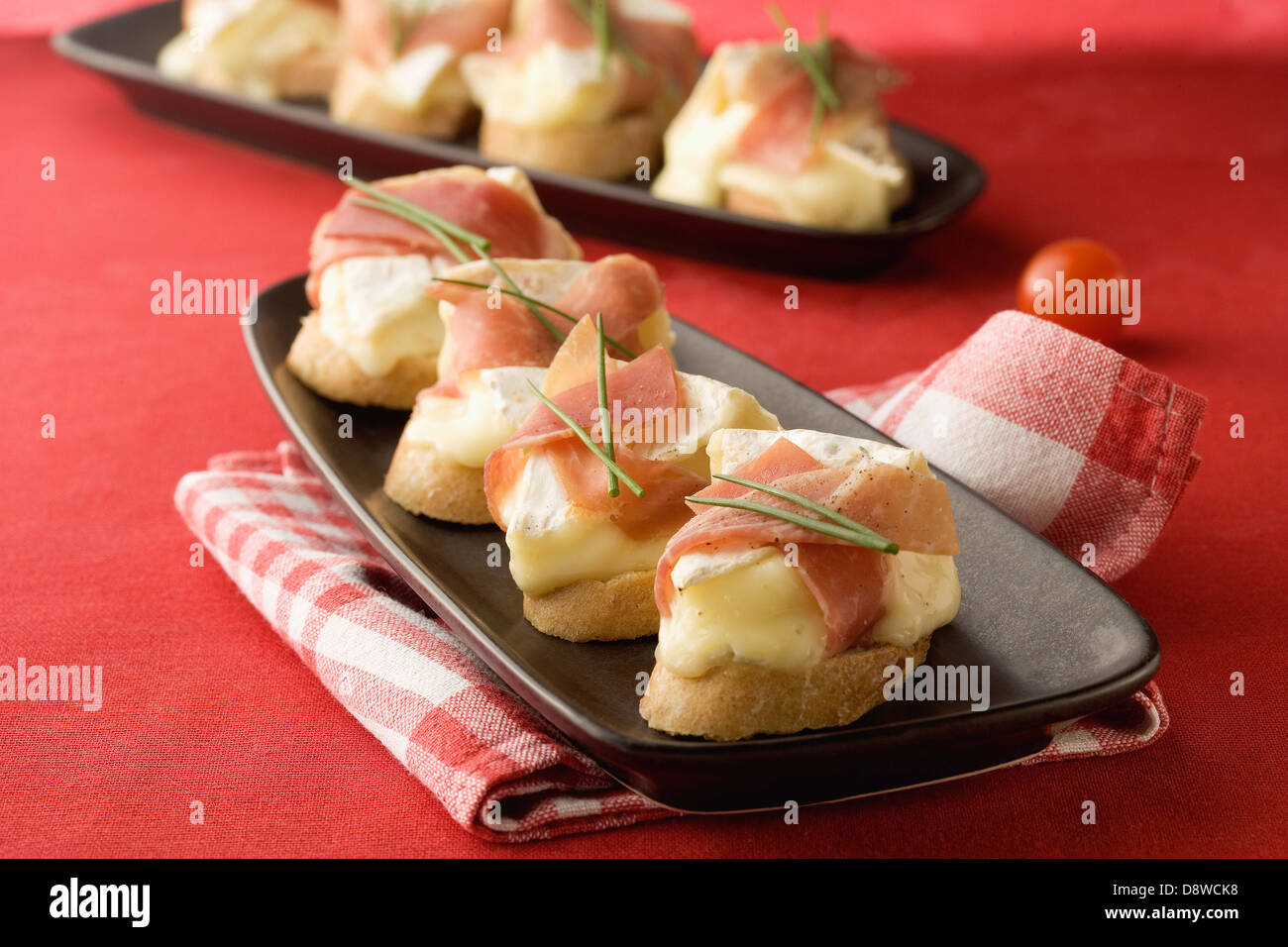 Camembert e prosciutto antipasti Foto Stock