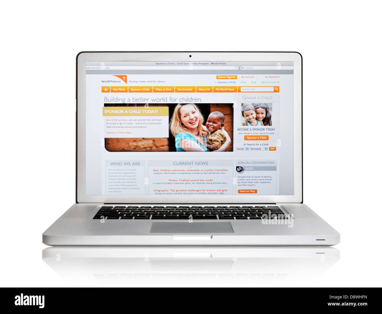 World Vision sito web su schermo portatile - Bambino Programma di sponsorizzazione Foto Stock