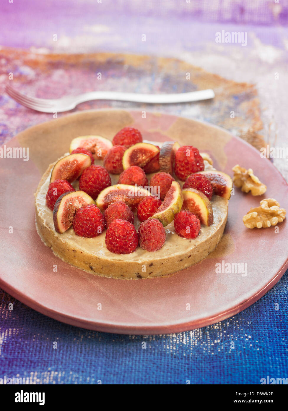 Banana,prune,almond data,fig e lampone tartlet Foto Stock