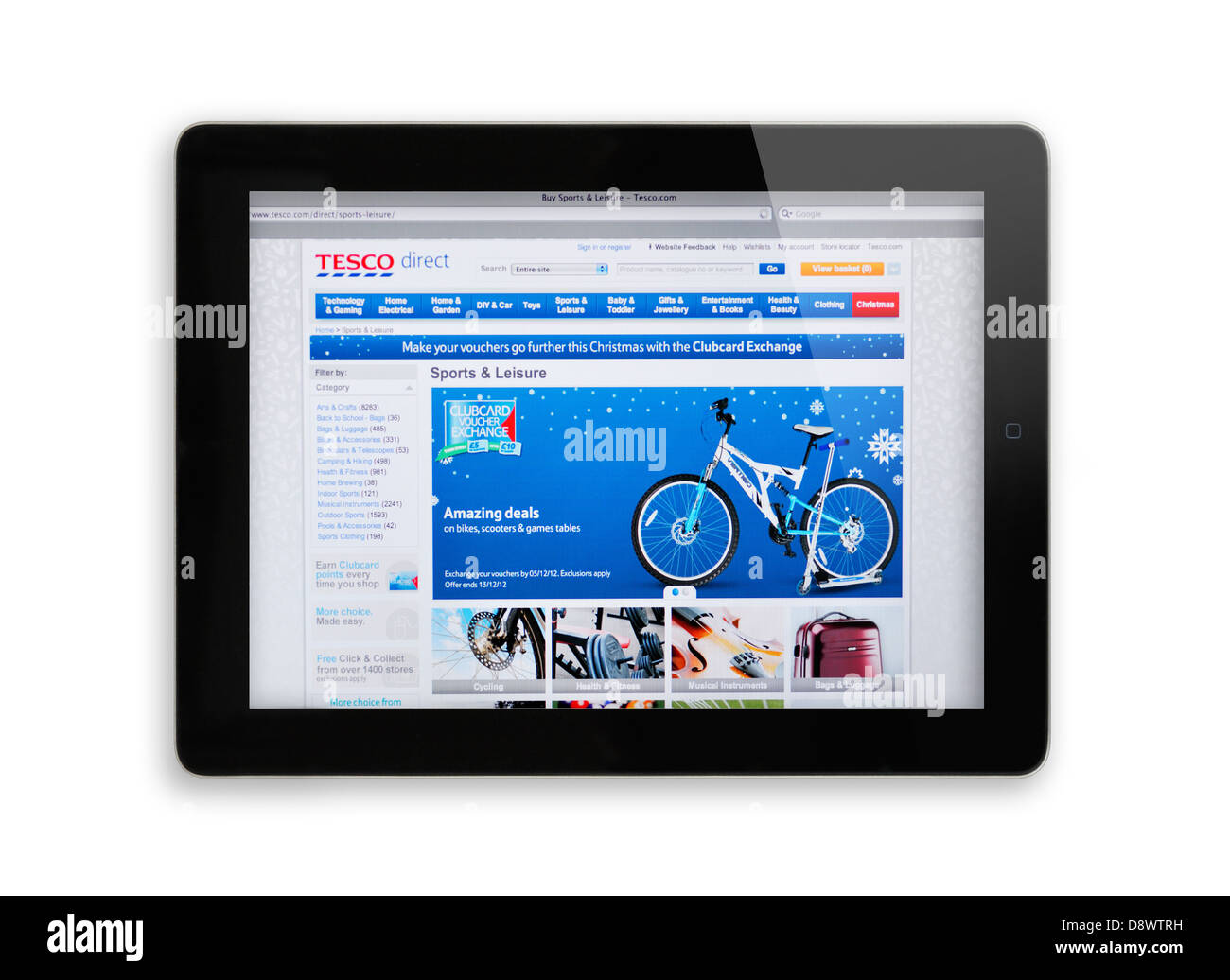 Lo schermo di iPad che mostra la Tesco sito web - online shopping Foto Stock