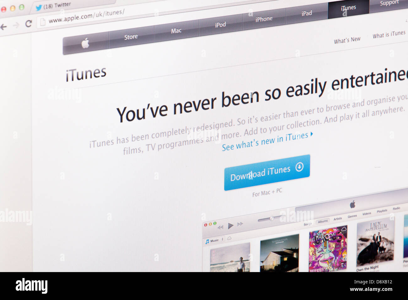 La musica di iTunes sito o pagina web su uno schermo di computer portatile o sul monitor di un computer Foto Stock