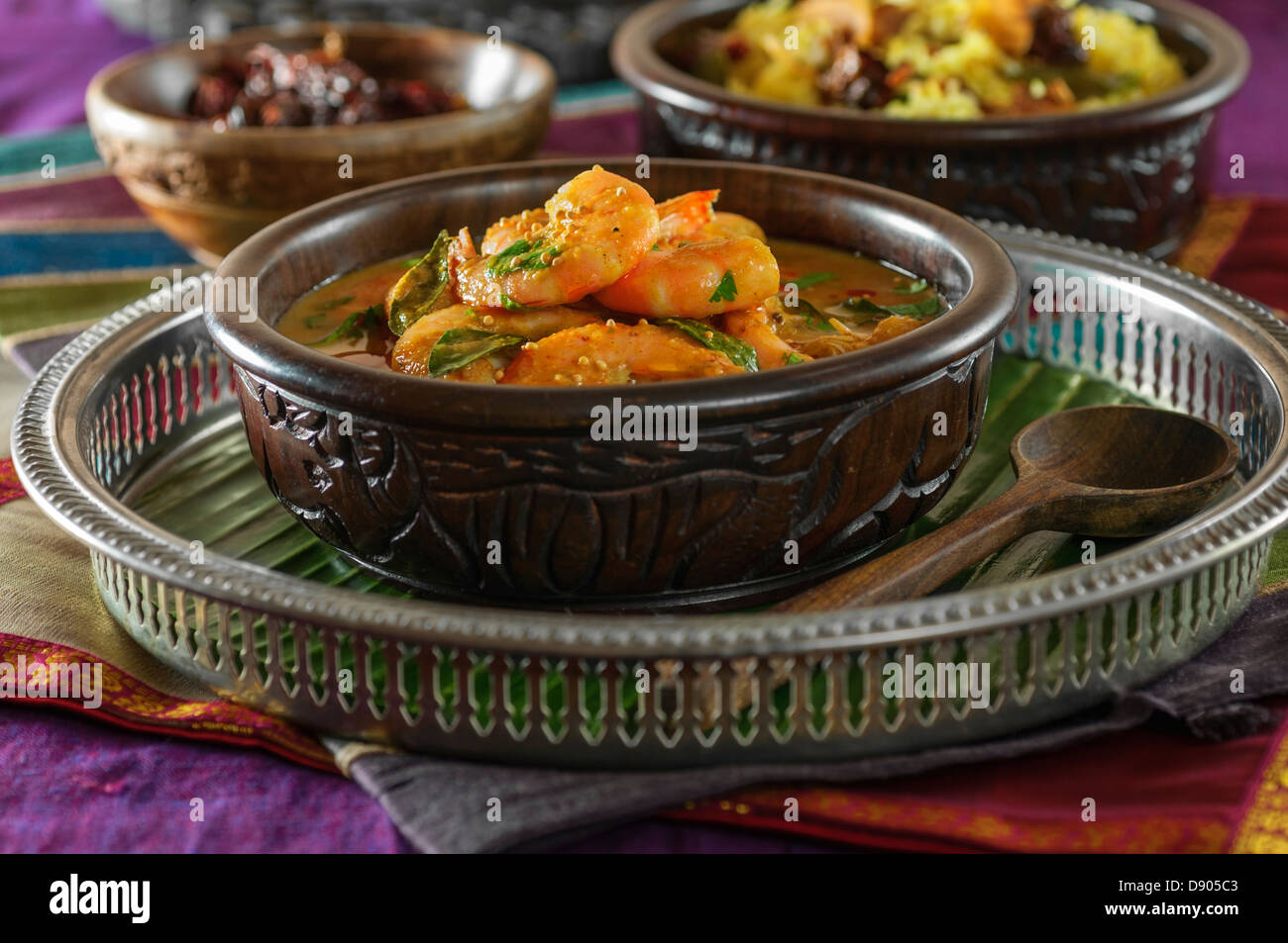 Chettinad curry di gamberi. Gamberi cotti con foglie di curry, tamarindo e cocco. Tamil Nadu India cibo Foto Stock