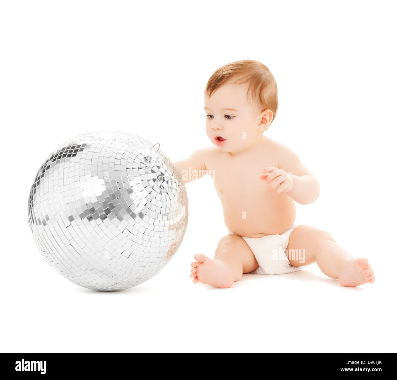 Bambino che gioca con la palla da discoteca Foto Stock