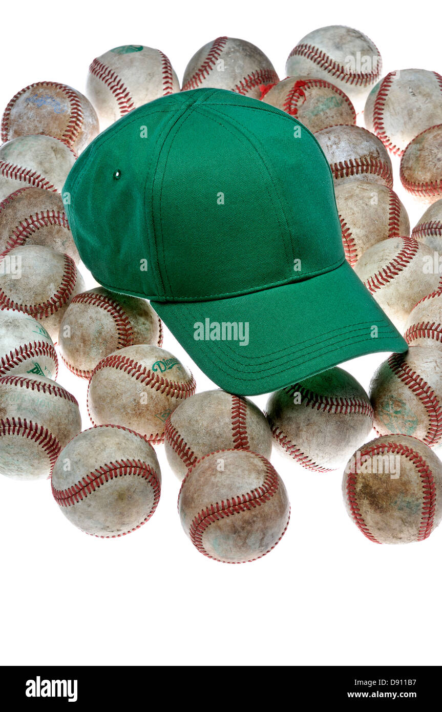Baseballs e un cappuccio, close-up. Foto Stock