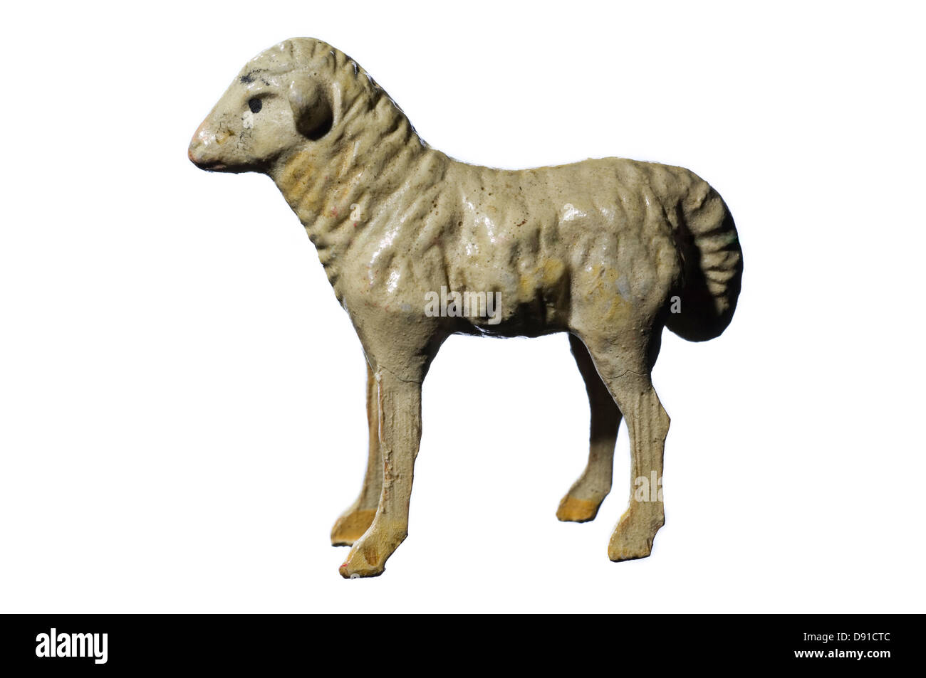 Figurina di pecore contro uno sfondo bianco Foto Stock