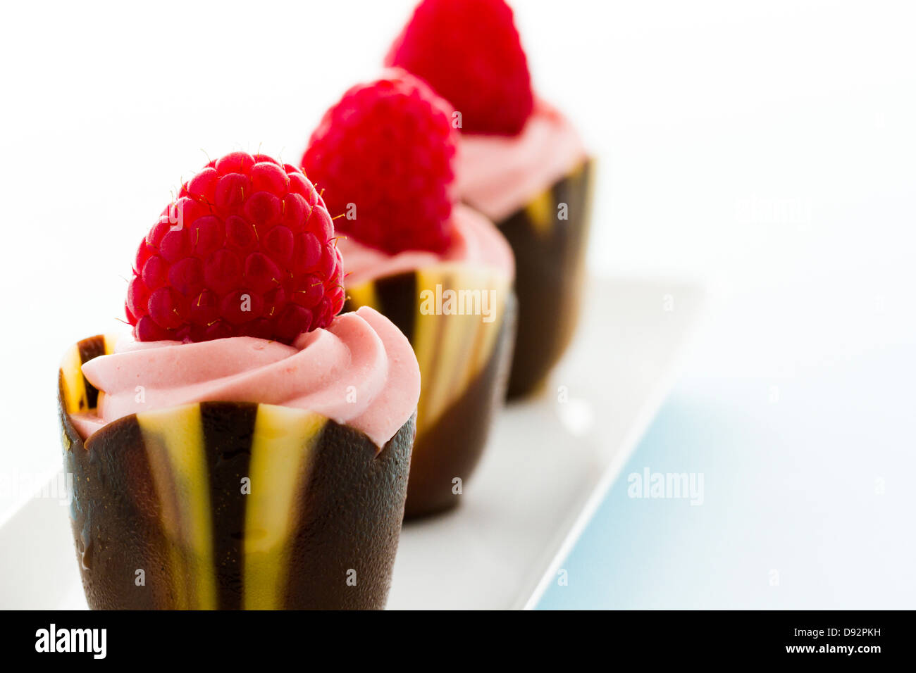 Cioccolatino reaspherry tulip tazze al bar dessert. Foto Stock