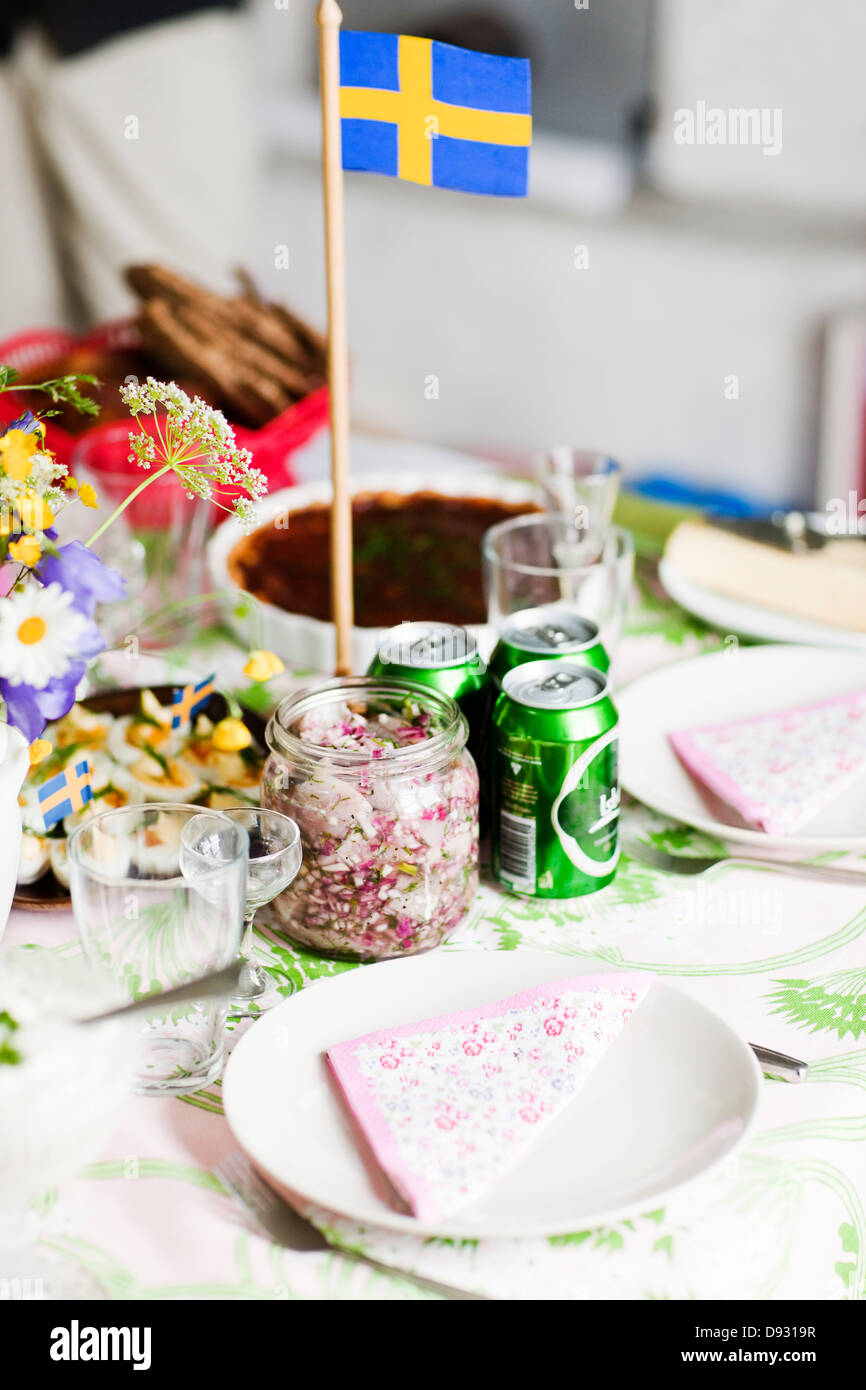 Posizionare l'impostazione con la bandiera svedese Foto Stock