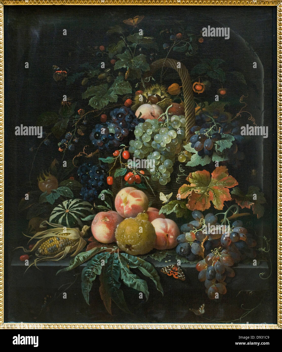 Abramo Mignon frutti, basket, butterfly sfondo nicchia in pietra del XVII secolo di scuola fiamminga Parigi Museo del Louvre Foto Stock