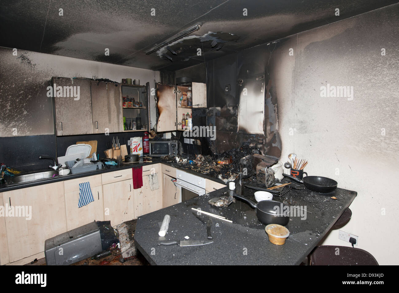 Grave Incendio di cucina pan di alimentare la Coppa di chip Foto Stock