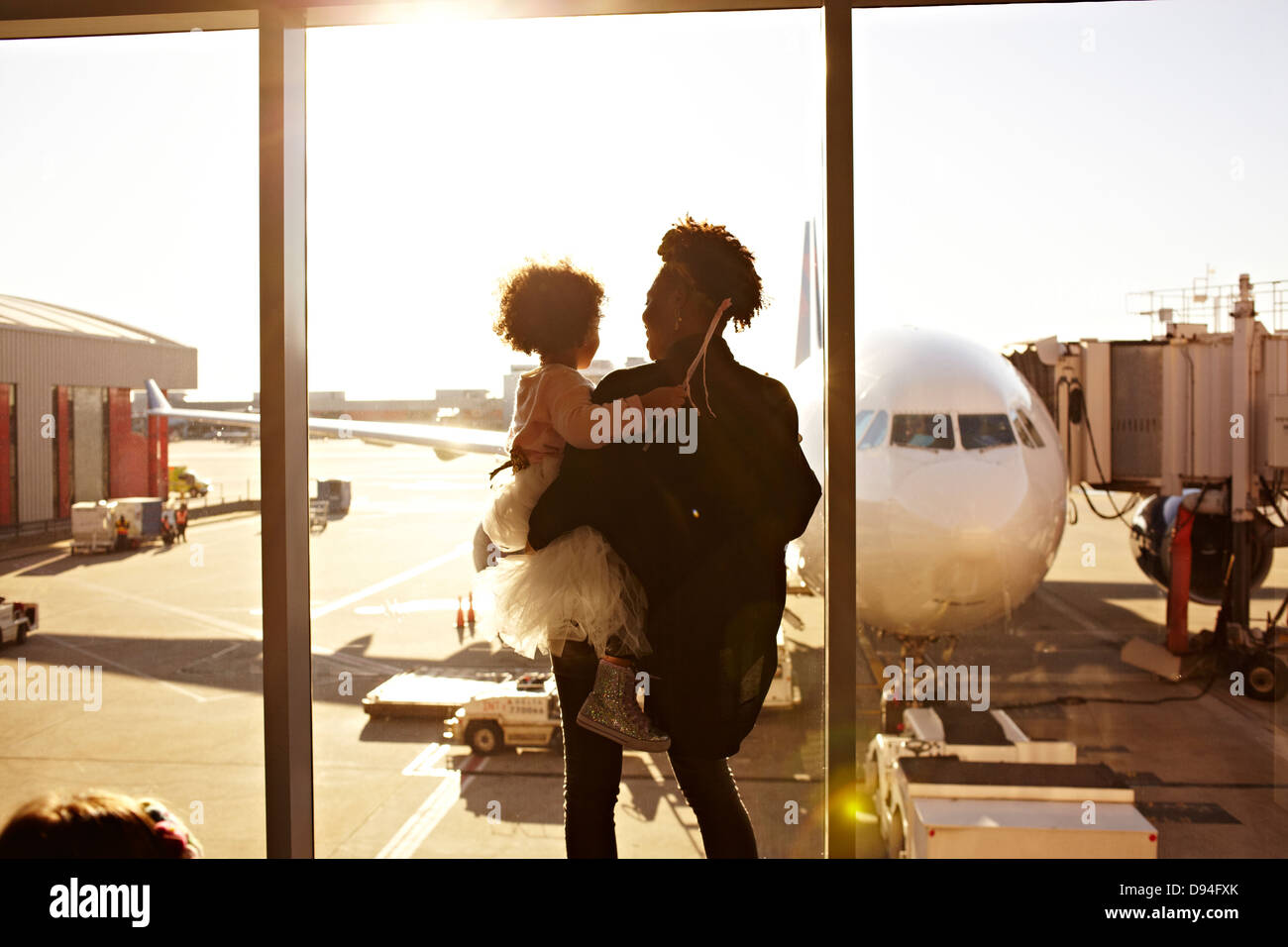Azienda madre figlia in aeroporto Foto Stock