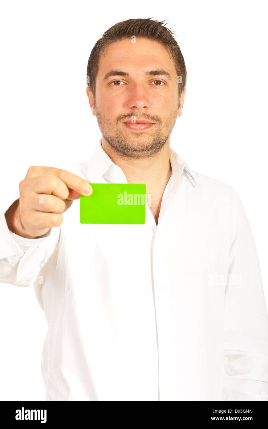 Imprenditore dando verde carta da visita isolato su sfondo bianco Foto Stock