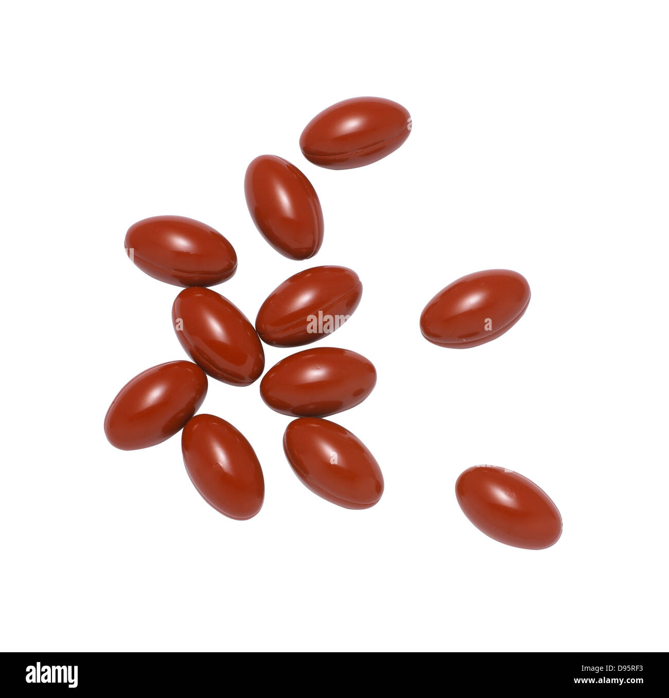 Red pillole ritagliato su uno sfondo bianco Foto Stock