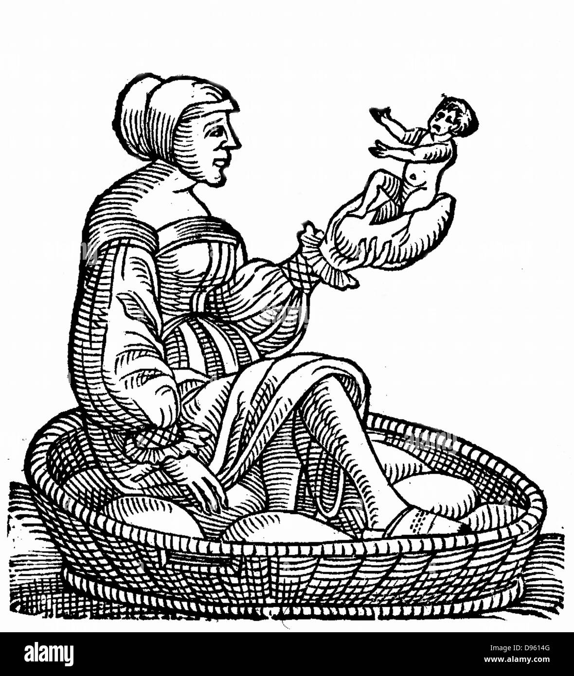 Donna cova un bambino da un uovo ha incubata. Incidente segnalato dal greco antico storico Erodoto (c485-425 BC). Xilografia da Conrad Lycosthenes 'Prodigiorum ac ostentorum chronicon', Basilea, 1557. Foto Stock