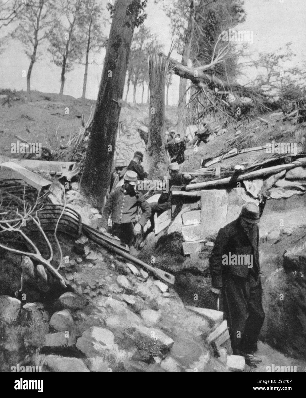 I Guerra Mondiale 1914-1918: soldati francesi esaminando una trincea danneggiati da azioni nemiche. Da 'Le Flambeau", Parigi, 18 settembre 1915. Foto Stock