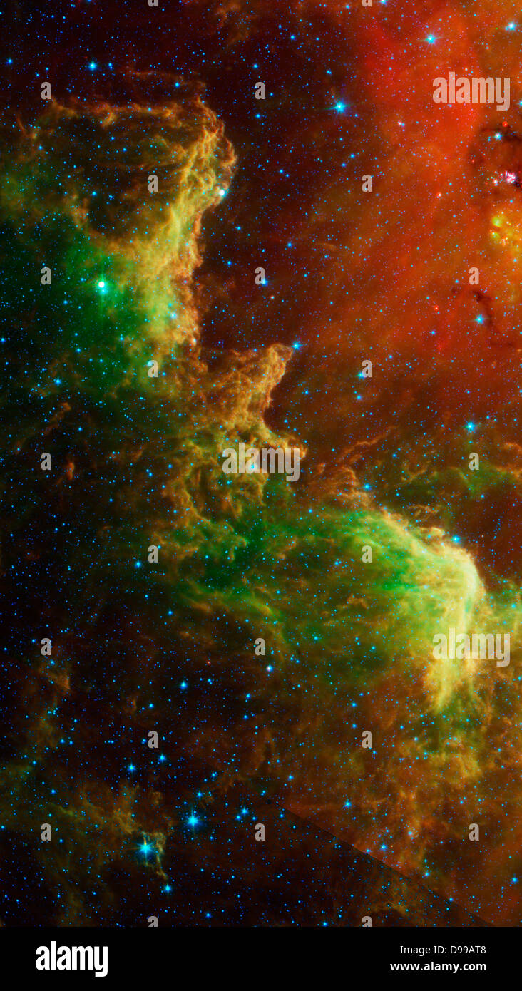 Questo paesaggio di vorticazione di stelle è noto come il Nord America nebulosa. Spitzer. Foto Stock