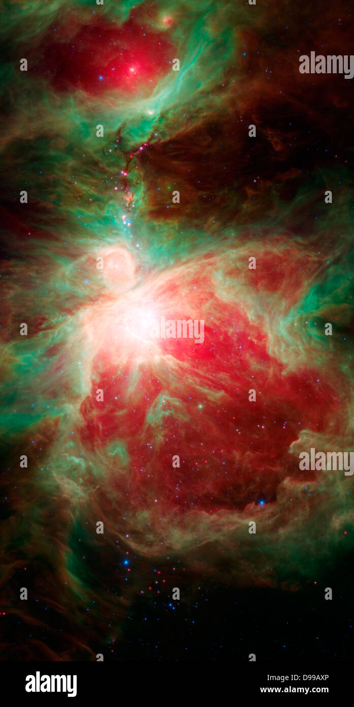 Questa immagine dalla NASA il telescopio spaziale Spitzer mostra ciò che si trova nei pressi di La spada della costellazione di Orione -- attivo un vivaio stellare contenente migliaia di giovani stelle e sviluppando protostars. Foto Stock