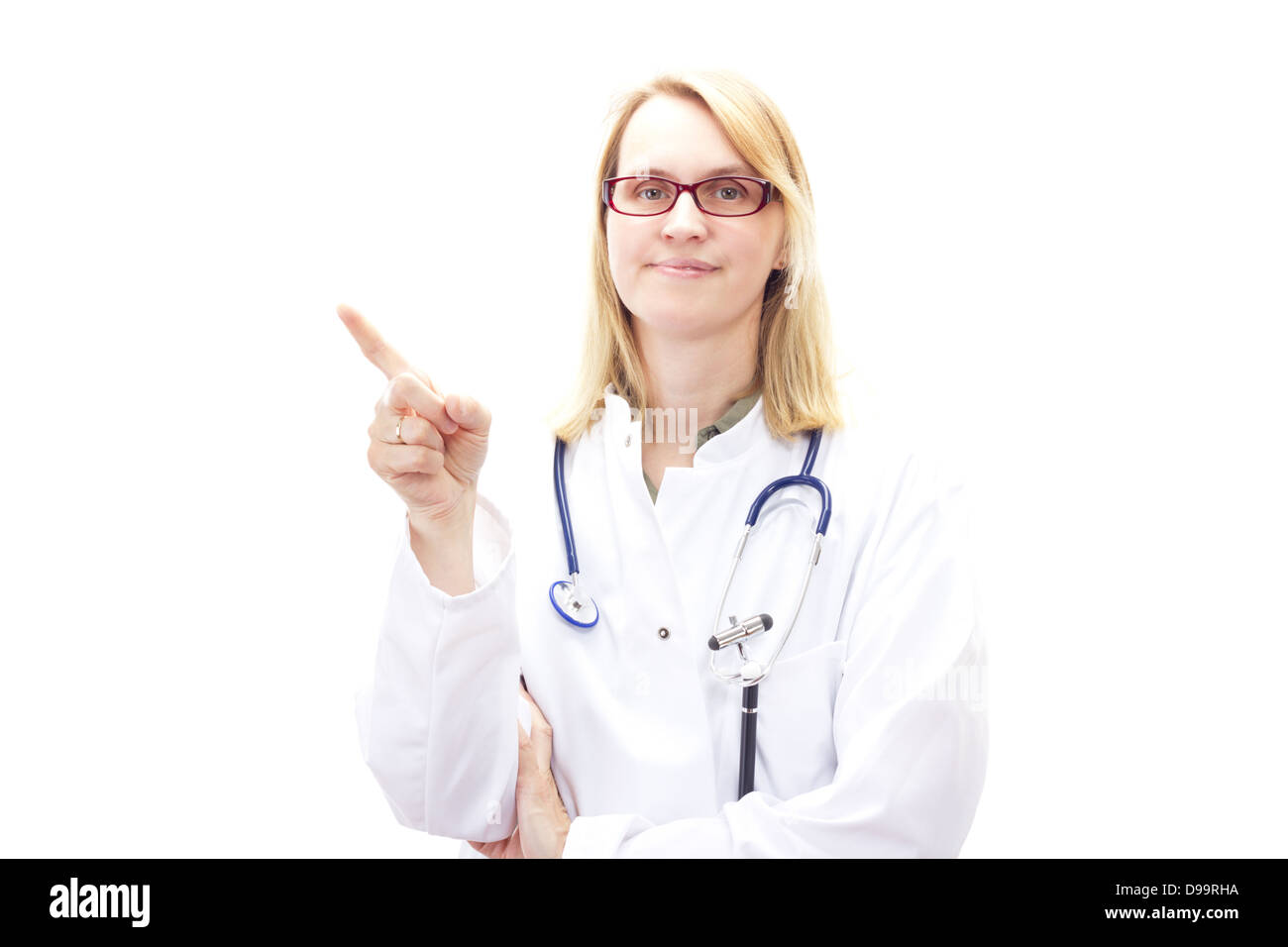 Femmina professionale medico puntando verso qualcosa di Foto Stock