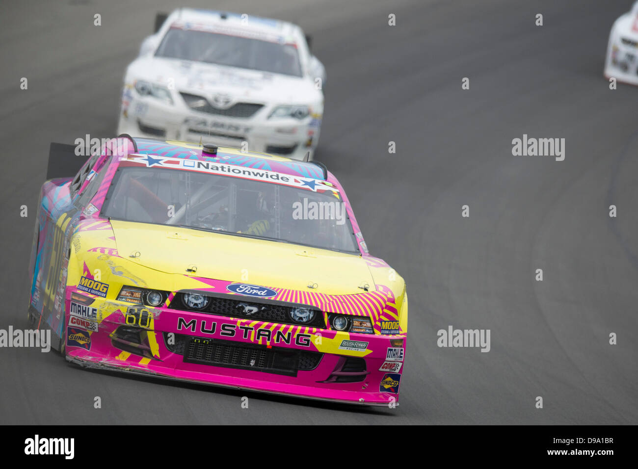 Brooklyn, MI, Stati Uniti d'America. Il 15 giugno, 2013. Brooklyn, MI - giu 15, 2013: Travis Pastrana (60) aziona in giro quattro durante l'Alleanza parti del carrello 250 presso il Michigan International Speedway di Brooklyn, MI Credito: csm/Alamy Live News Foto Stock