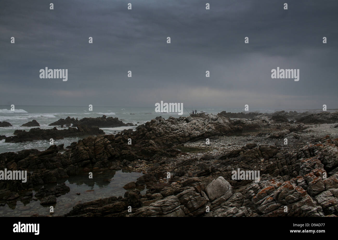 Pioggia nuvole sopra Cape Agulhas Foto Stock