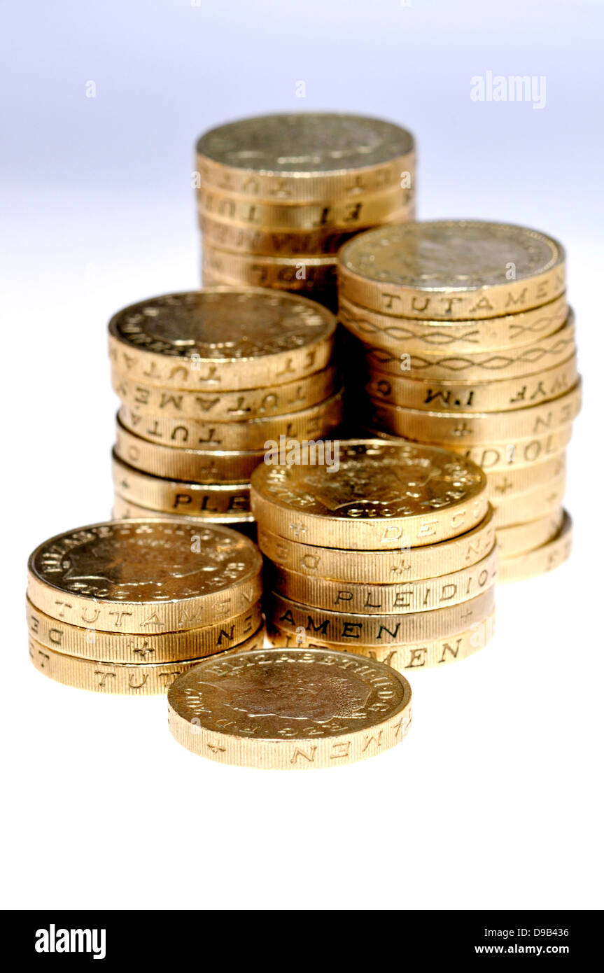 Pile di British pound monete Foto Stock