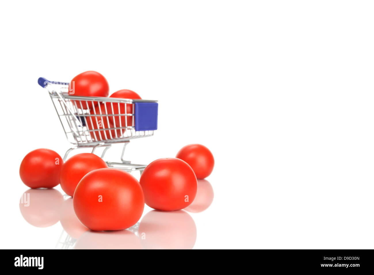 I carrelli della spesa e pomodori Foto Stock