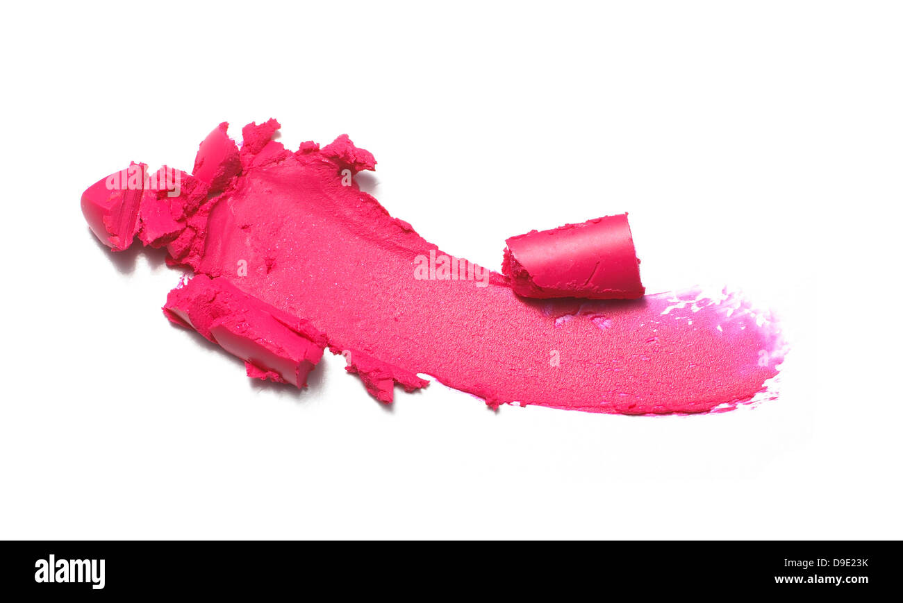 Schiacciare sbavature del rossetto ritagliato su uno sfondo bianco Foto Stock