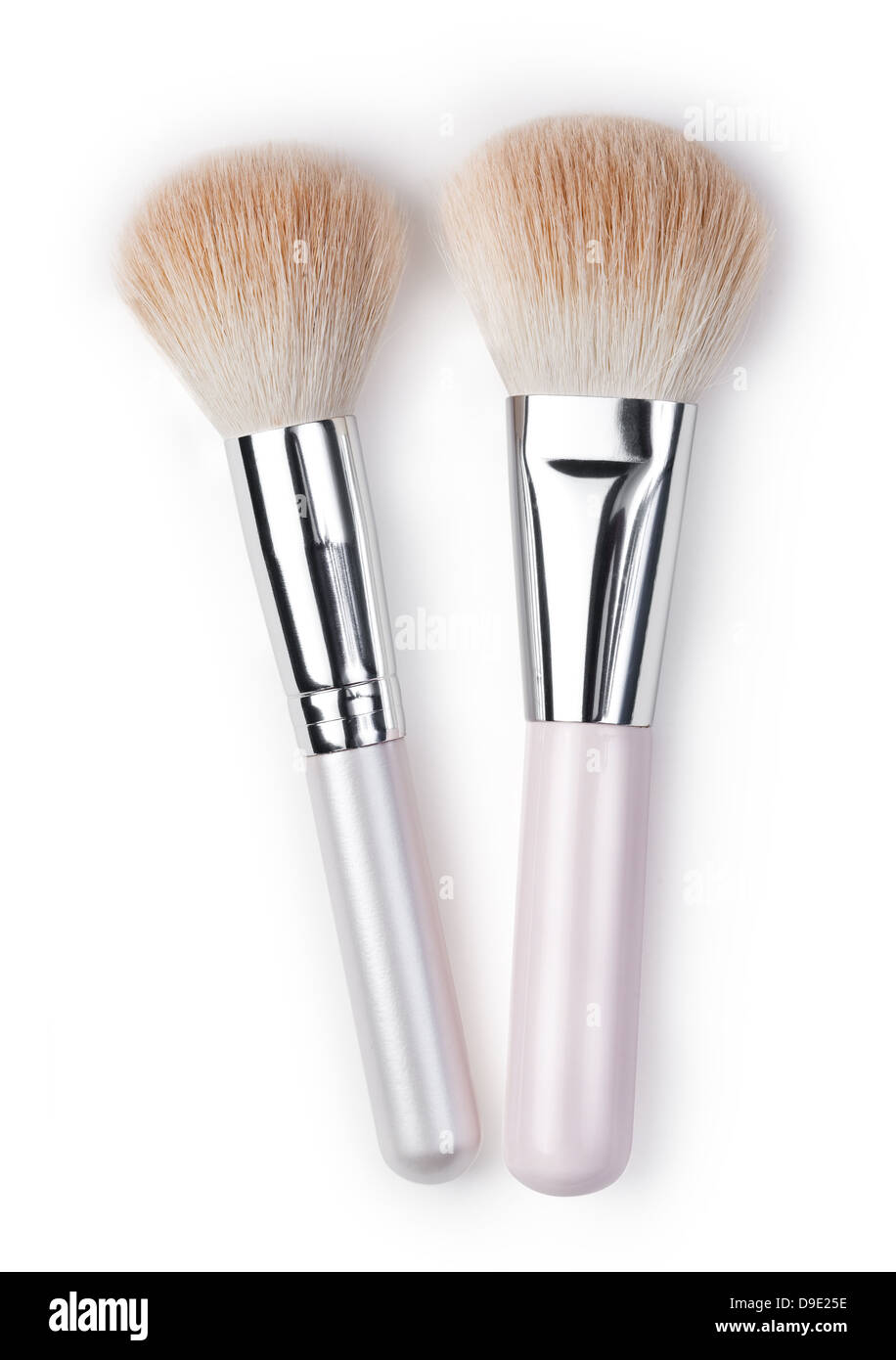 Spazzole cosmetiche su bianco Foto Stock