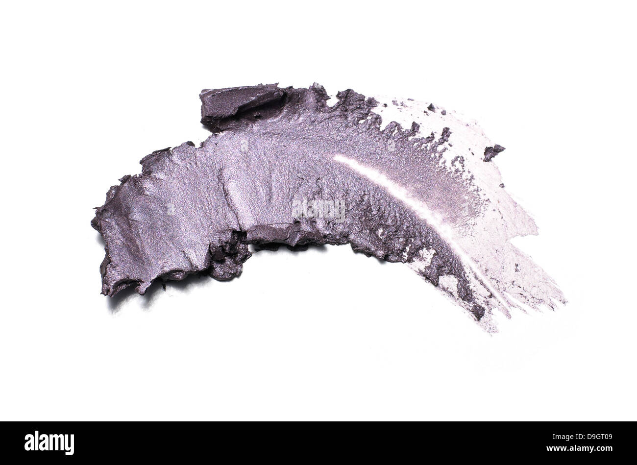 Crema viola ombretto cospargere ritagliato su uno sfondo bianco Foto Stock