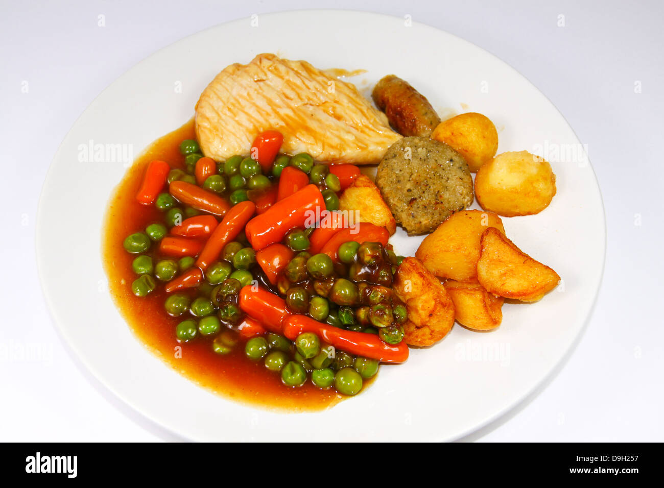 Pollo arrosto cena sulla piastra bianca Foto Stock