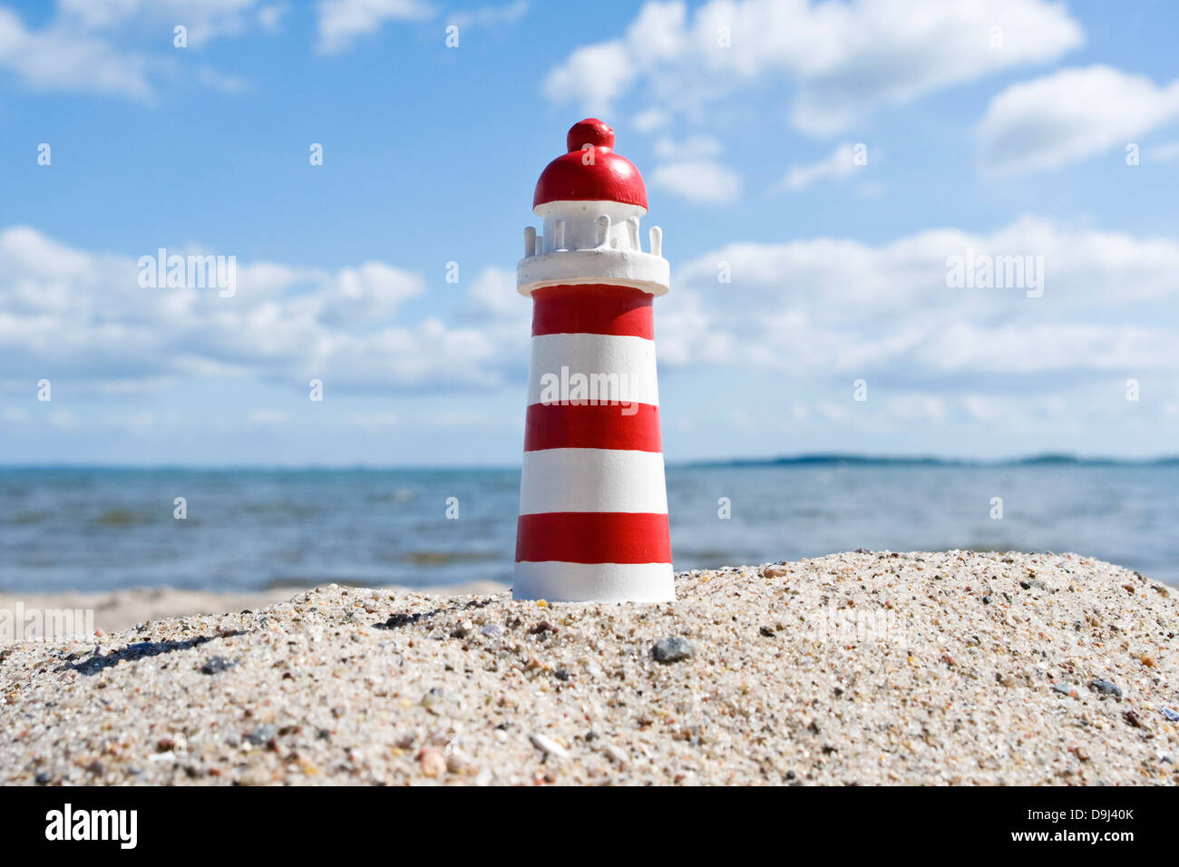 Faro sulla spiaggia Foto Stock