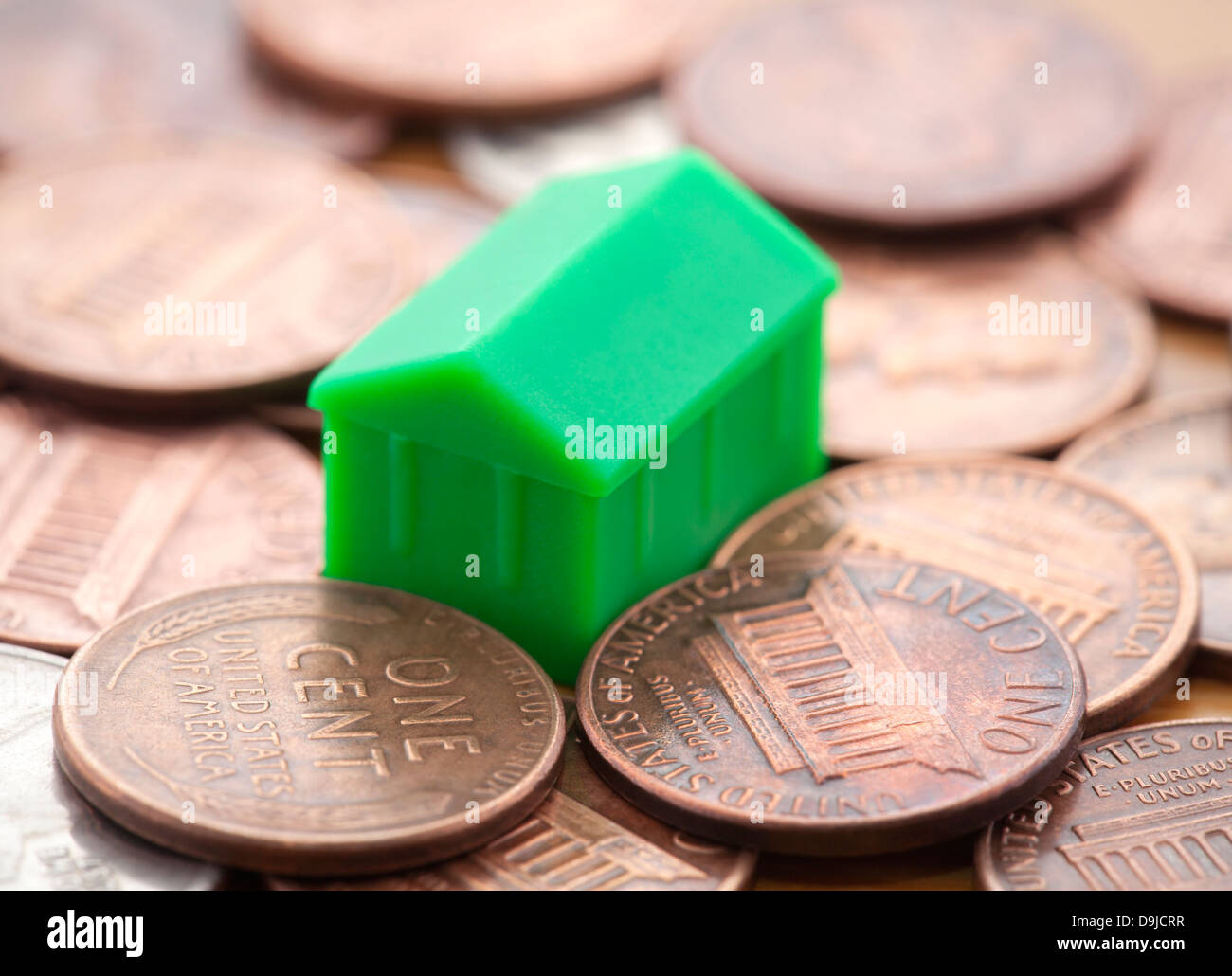 Miniaturizzate green house a noi delle monete in euro Foto Stock