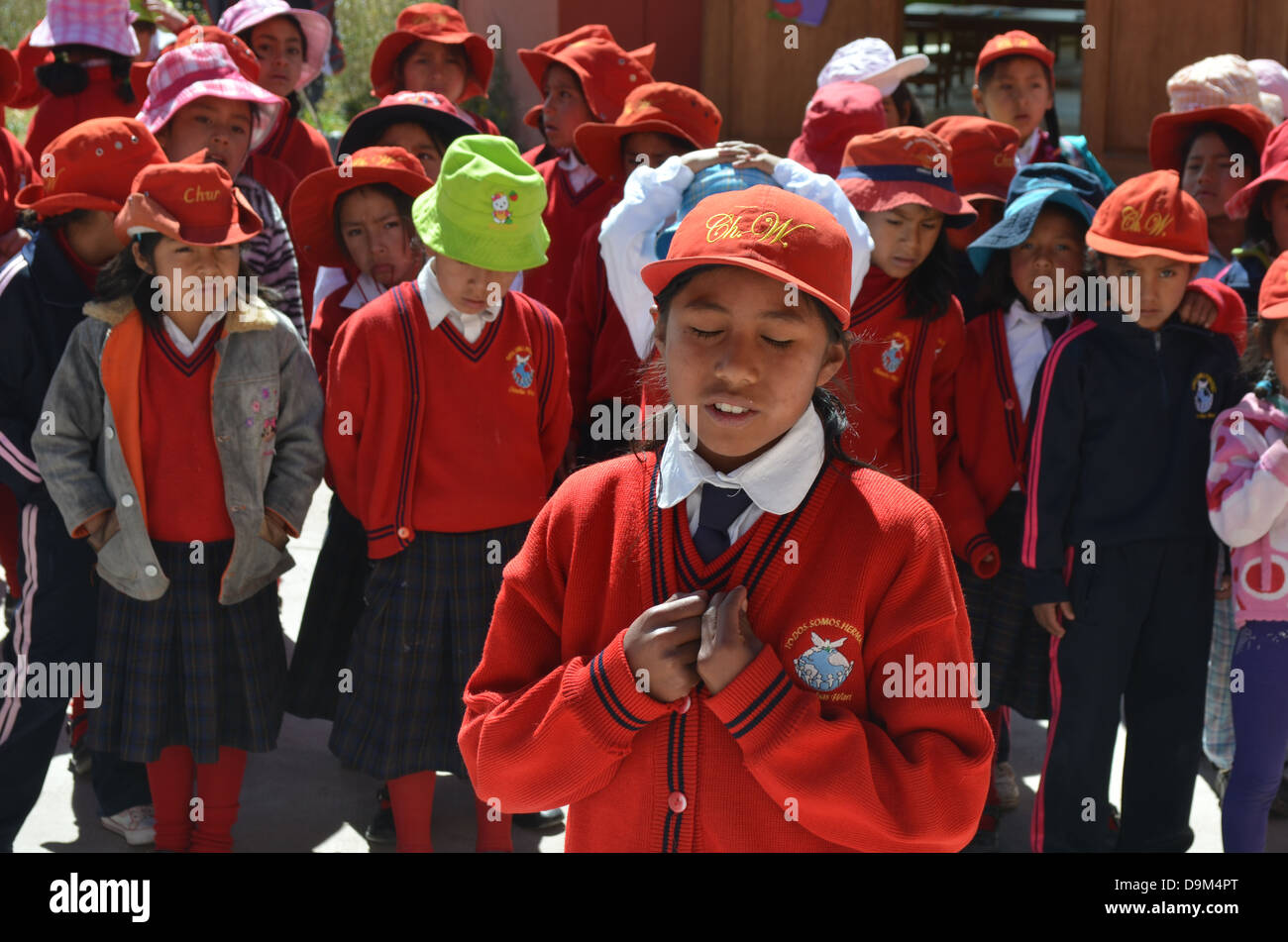 Scolare al Chicuchaswasi progetto scuola vicino a Cusco, Perù, a progetti di beneficenza aiutando i bambini in stato di bisogno. Foto Stock